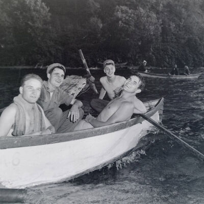 Four soldiers in a rowboat