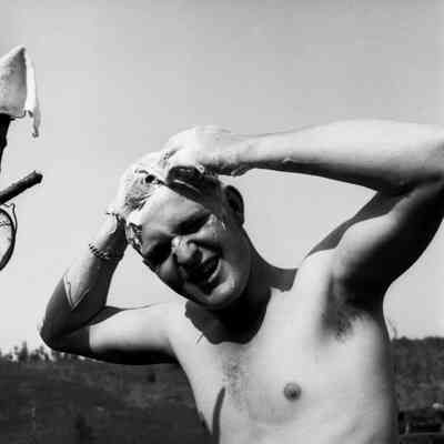 Soldier washing his hair