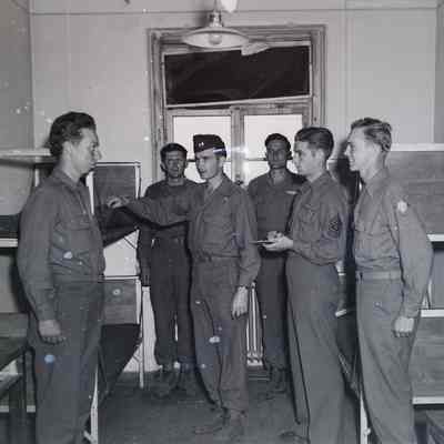 Officer inspecting bunks