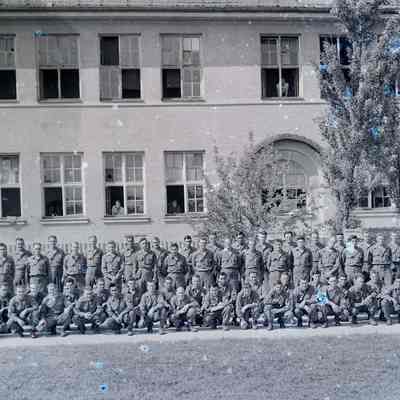 Large group of soldiers in front of building