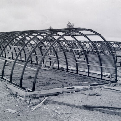 Quonset huts under construction