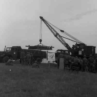 Soldiers training to construct a pontoon bridge