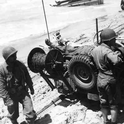 Wounded soldier on Jeep