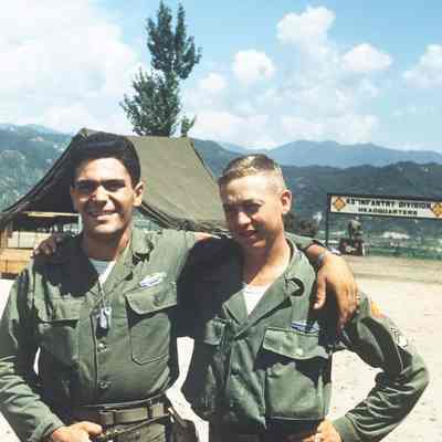 Two soldiers posing at headquarters