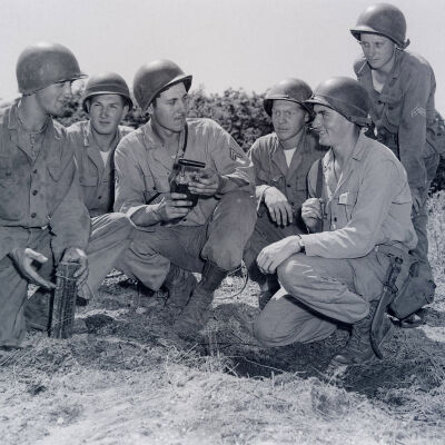 Group of soldiers training with detonator and explosives