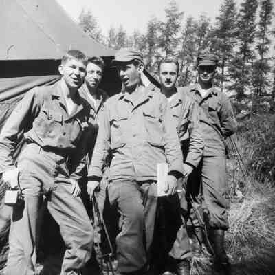 Group of soldiers in front of a tent