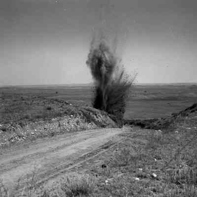 Dirt geyser from a shell or explosive charge