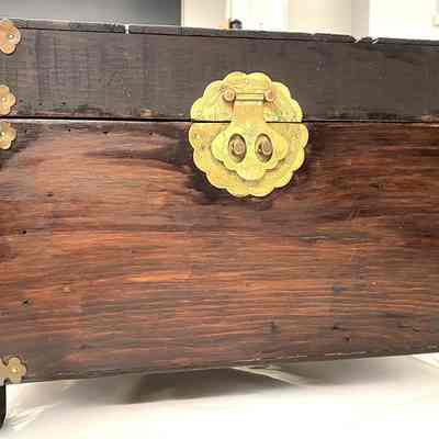 Lacquered Trunk Filled with Porcelain and Fabric