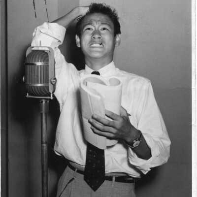 Photograph of Bruce Lee in a recording studio