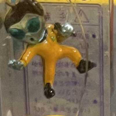 Alien Bruce Lee charm