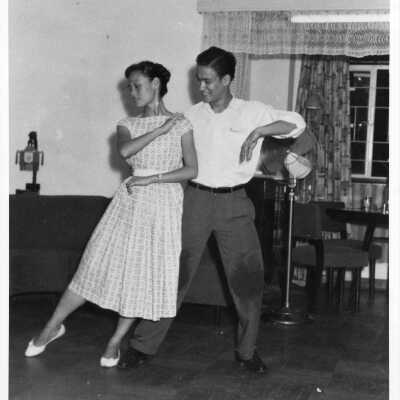 Photograph of Bruce Lee with a dance partner