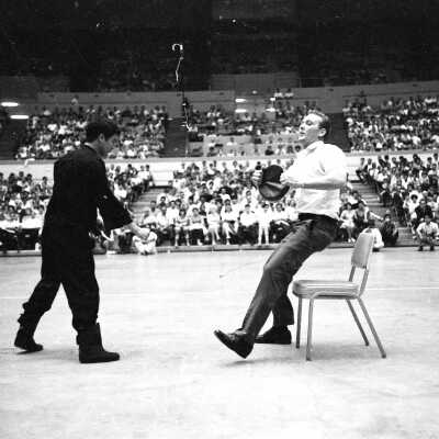 Photograph of Bruce Lee in martial arts demonstration