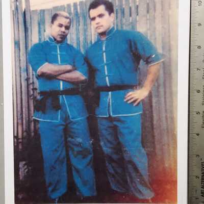 Young Jesse Glover and friend in Kung Fu training clothes