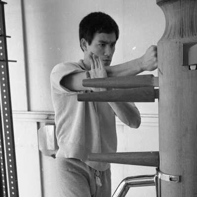 Bruce Lee Training with Wooden Dummy