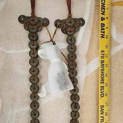 Two Sword-like Objects made with Coins