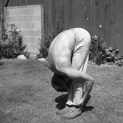 Bruce Lee in forward bend stretch