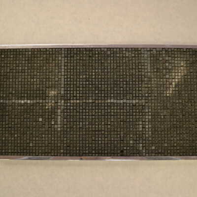 A Box with Metal Type Pieces
