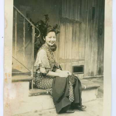 Photograph, Woman Sitting on Staircase