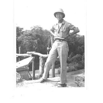 William Hoy Overseas by a Wooden Bridge