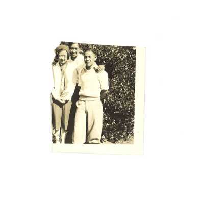 Two Chinese Males and One Chinese Female Outdoors