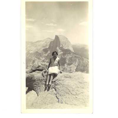 Chinese Woman Sitting in Front of Half Dome, Yosemite