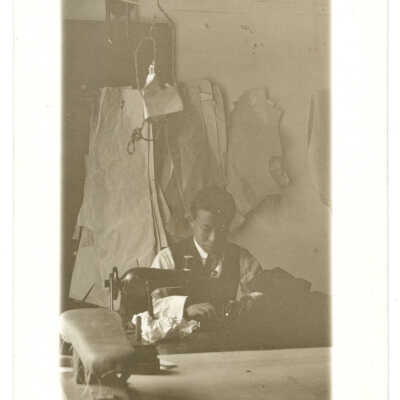 A Chinese Man Sewing