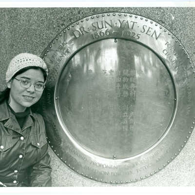 Photograph, A Woman in front of Dr. Sun Yat Sen Monument