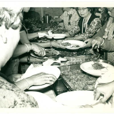 Photograph, People having dinner