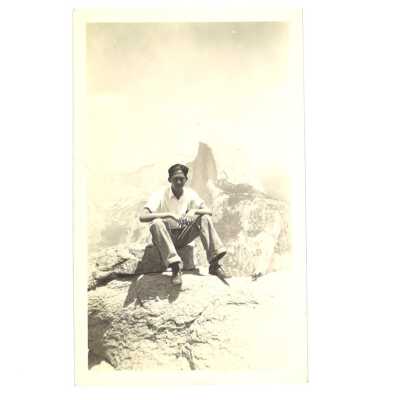 Chinese Man Sitting in Front of Half Dome, Yosemite