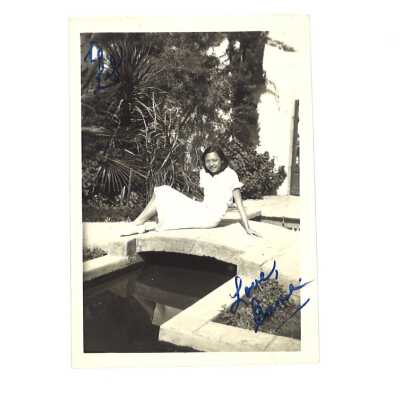 Chinese Woman Posing on a Concrete Bridge