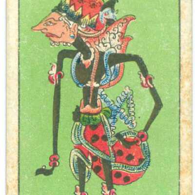 Trade card, Green background with skinny black man wearing headdress
