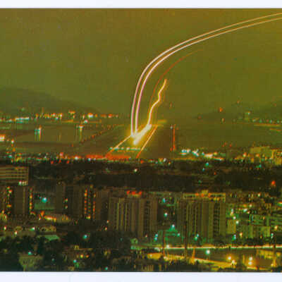 Postcard Set, China, Hong Kong, View of Plane Making a Night Landing at Kaitak