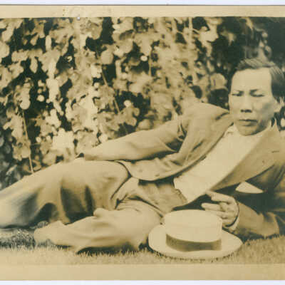 Chinese Man Lying on His Side