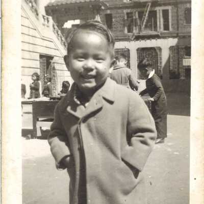 Photograph of a Student with a Coat