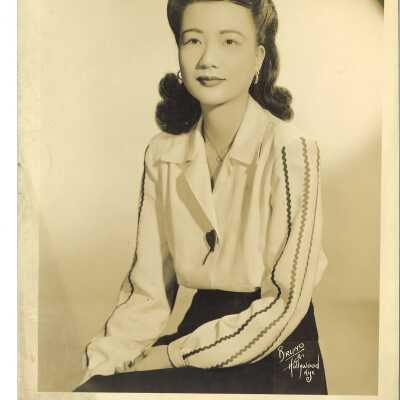 A Young Woman Sitting for a Portrait