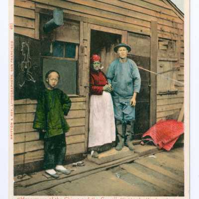 Postcard, Family in front of wooden house
