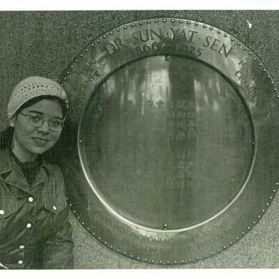 Photograph, A women in front of Dr. Sun Yat Sen Monument