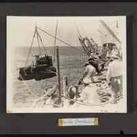 Tractor being off-loaded
