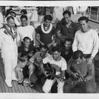 Left to right: William T. Miller, Superintendent of airways, U.S. Dept. of Commerces Bureau of Aeronautics; Luther Waiwaiole, William Yomes, Solomon Kalama, Georger Kahanu. Sitting l-r: Henry Mahikoa, James Carroll, Henry Ohumukini, Joseph Kim, Alex Kahapea