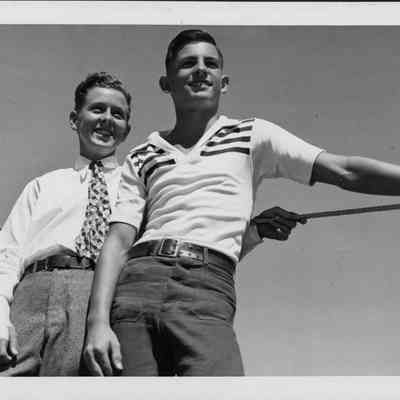 Left - Right: Richard Stafford and Robert Hite, son of Hawaii's acting governor Charles M. Hite. Schoolboys of Hawaii left Honolulu on the U.S. Cost Guard cutter Itasca for Baker, Howland and Jarvis Islands.