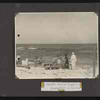 Image of supplies being off loaded on shore
