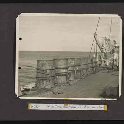 Fifty-four gallon drums of water on the ship