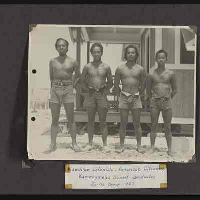 Image of four colonists on Jarvis Island. Original caption reads "Hawaiian Colonists - American Citizens, Kamehameha School Graduates, Jarvis Group 1937"