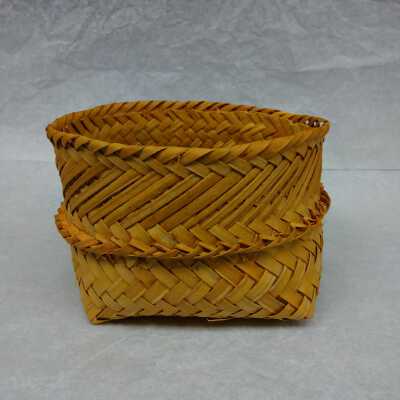 Woven reed/palm basket