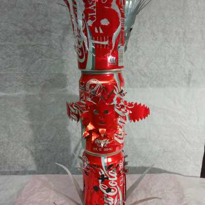 Carved Coca-Cola Cans