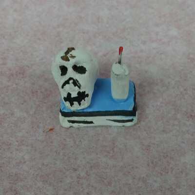 Small White Skull and Candle