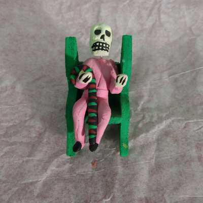Miniature Skeleton in rocking chair