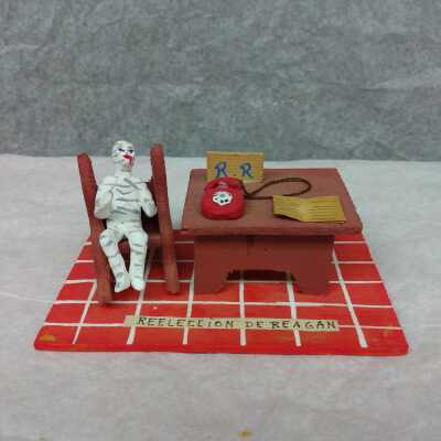 Miniature mummy in an office