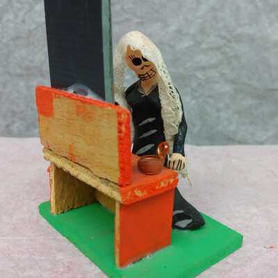 Miniature of a widow at a mirror