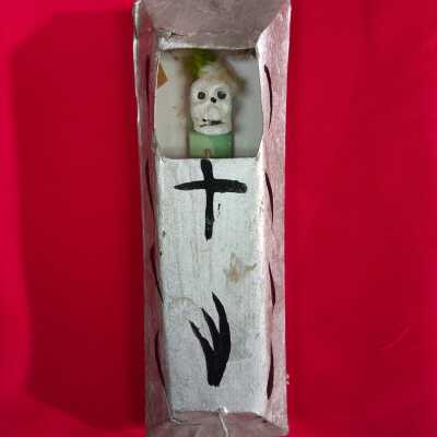 Silver Coffin with skeleton inside